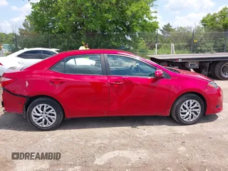 2018 Toyota Corolla L with VIN 2T1BURHE7JC105479, listed as a IAAI auction lot 42540566 with 67,487 mi miles and . Bid and sale history available at DreamBid. Image 13.