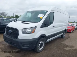 2023 Ford Transit Cargo with VIN 1FTBR1C8XPKC07063, listed as a IAAI auction lot 42103484 with 12,946 mi miles. Bid and sale history available at carsss.com. Image 2.