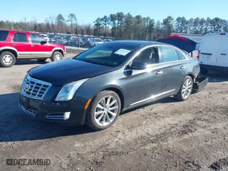 2013 Cadillac XTS Luxury with VIN 2G61P5S37D9104052, listed as a IAAI auction lot 41543339 with 118,984 mi miles. Bid and sale history available at carsss.com. Image 2.