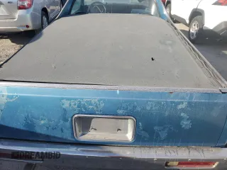 1987 Chevrolet El Camino z VIN 3GCCW80Z9HS905561, wystawiony jako Copart lot #75401604 z przebiegiem 32 958 mil mil oraz Szkody całkowita. Historia ofert i sprzedaży dostępna na DreamBid. Obrazek 10.