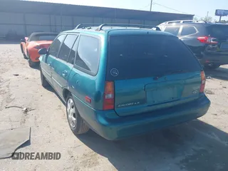 1997 Ford Escort LX z VIN 3FALP15P7VR158272, wystawiony jako IAAI lot #41833216 z przebiegiem 148 170 mil mil oraz . Historia ofert i sprzedaży dostępna na DreamBid. Obrazek 3.