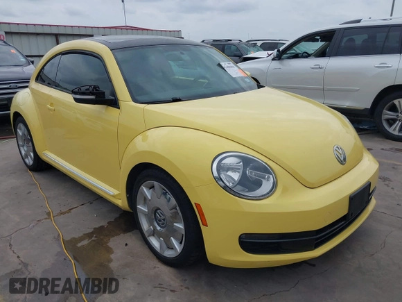 2013 Volkswagen Beetle 2.5L with VIN 3VWHX7AT7DM604449, listed as a IAAI auction lot 42406666 with 104,874 mi miles and . Bid and sale history available at DreamBid. Image 1.
