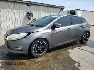 2014 Ford Focus SE z VIN 1FADP3K27EL423313, wystawiony jako Copart lot #52149985 z przebiegiem 128 567 mil mil oraz Szkoda całkowita • Salvage title. Historia ofert i sprzedaży dostępna na DreamBid. Obrazek 1.