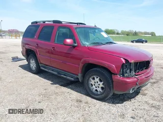 2005 Chevrolet Tahoe LT z VIN 1GNEK13T25R261555, wystawiony jako IAAI lot #42060225 z przebiegiem 151 190 mil mil oraz . Historia ofert i sprzedaży dostępna na DreamBid. Obrazek 1.
