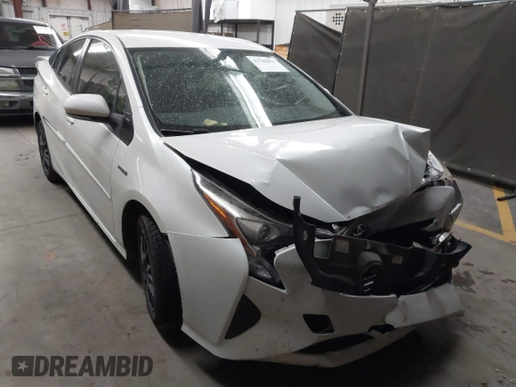 2016 Toyota Prius Two with VIN JTDKBRFU3G3513060, listed as a IAAI auction lot 41789034 with 153,391 mi miles and . Bid and sale history available at DreamBid. Image 1.