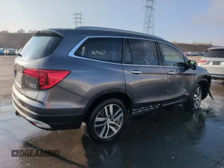 2017 Honda Pilot Touring with VIN 5FNYF6H95HB083610, listed as a Copart auction lot 50806045 with 200,897 mi miles and Salvage Title. Bid and sale history available at DreamBid. Image 3.
