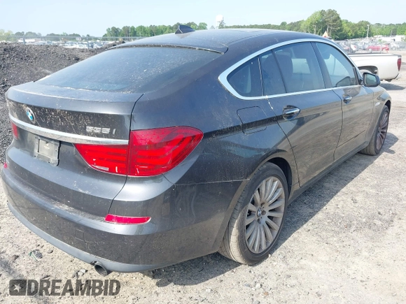 2013 BMW 5 Series GT 535i xDrive with VIN WBASP2C59DC339770, listed as a IAAI auction lot 42171135 with 106,625 mi miles. Bid and sale history available at carsss.com. Image 4.
