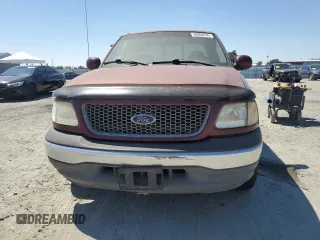 1999 Ford F-150 XL with VIN 1FTRX17L2XKB78998, listed as a Copart auction lot 65004535 with 155,271 mi miles and Salvage title. Bid and sale history available at DreamBid. Image 5.