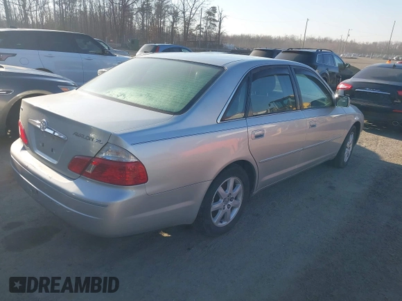 2003 Toyota Avalon XL with VIN 4T1BF28B13U307386, listed as a IAAI auction lot 41652379 with 149,730 mi miles and . Bid and sale history available at carsss.com. Image 4.
