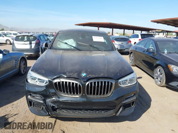 2020 BMW X4 M40i with VIN 5UX2V5C04L9D26548, listed as a IAAI auction lot 42473480 with Not provided miles and . Bid and sale history available at DreamBid. Image 12.