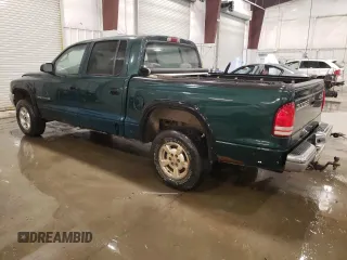 2002 Dodge Dakota SLT with VIN 1B7HG48N42S725145, listed as a Copart auction lot 82690584 with 159,161 mi miles and Salvage Title. Bid and sale history available at carsss.com. Image 2.