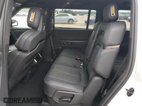 2024 Rivian R1S Adventure z VIN 7PDSGABA7RN034025, wystawiony jako Copart lot #55949335 z przebiegiem 14 429 mil mil oraz Szkody całkowita. Historia ofert i sprzedaży dostępna na DreamBid. Obrazek 11.