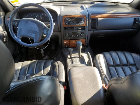 1999 Jeep Grand Cherokee Limited with VIN 1J4GW68N7XC578504, listed as a Copart auction lot 43684275 with 163,752 mi miles and Clean Title. Bid and sale history available at carsss.com. Image 8.