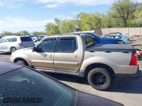 2001 Ford Explorer Sport Trac z VIN 1FMZU77E41UA58737, wystawiony jako IAAI lot #42099243 z przebiegiem 203 593 mil mil oraz . Historia ofert i sprzedaży dostępna na DreamBid. Obrazek 14.