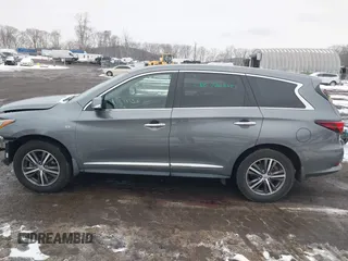 2019 Infiniti QX60 Luxe with VIN 5N1DL0MM3KC532832, listed as a IAAI auction lot 41576352 with 68,691 mi miles and . Bid and sale history available at DreamBid. Image 14.
