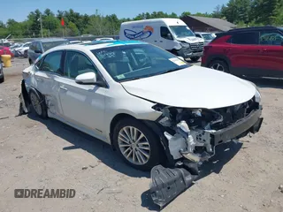 2014 Toyota Avalon Limited z VIN 4T1BD1EBXEU019339, wystawiony jako IAAI lot #42382508 z przebiegiem 107 269 mil mil oraz . Historia ofert i sprzedaży dostępna na DreamBid. Obrazek 1.