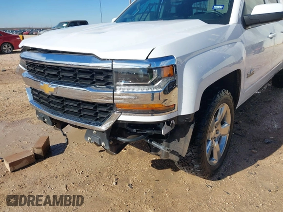 2018 Chevrolet Silverado 1500 LT with VIN 1GCRCREC4JZ368426, listed as a IAAI auction lot 41343347 with 114,821 mi miles and . Bid and sale history available at DreamBid. Image 19.