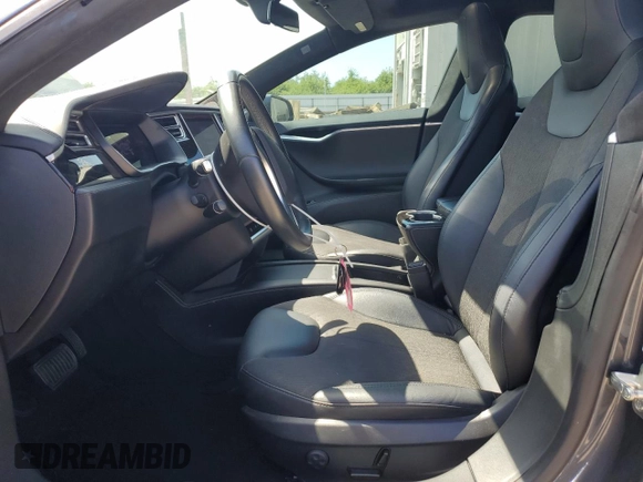 2016 Tesla Model S 90D with VIN 5YJSA1E22GF177120, listed as a Copart auction lot 51972885 with 73,441 mi miles and Salvage title. Bid and sale history available at DreamBid. Image 7.