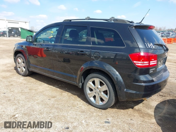 2010 Dodge Journey SXT with VIN 3D4PH5FV4AT135822, listed as a IAAI auction lot 42012480 with 124,480 mi miles and . Bid and sale history available at DreamBid. Image 3.
