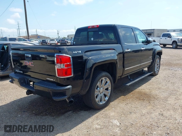 2015 GMC Sierra 1500 Denali z VIN 3GTU2WEJ9FG386812, wystawiony jako IAAI lot #42381651 z przebiegiem 138 009 mil mil oraz . Historia ofert i sprzedaży dostępna na DreamBid. Obrazek 4.