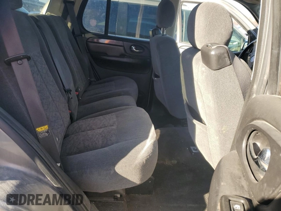 2005 GMC Envoy SLT with VIN 1GKDS13SX52322725, listed as a Copart auction lot 82032674 with 249,288 mi miles and Salvage Title. Bid and sale history available at carsss.com. Image 10.