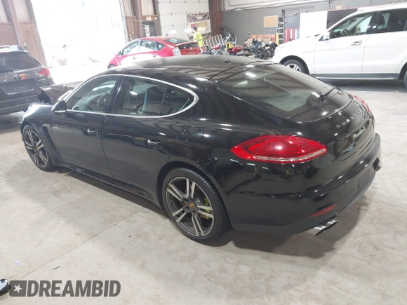 2016 Porsche Panamera S E-Hybrid z VIN WP0AD2A74GL040039, wystawiony jako IAAI lot #42411042 z przebiegiem 60 616 mil mil oraz . Historia ofert i sprzedaży dostępna na DreamBid. Obrazek 3.