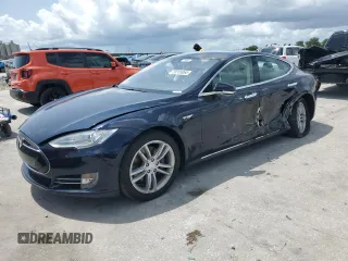 2014 Tesla Model S 60 with VIN 5YJSA1H12EFP61355, listed as a Copart auction lot 59709065 with 109,446 mi miles and Salvage title. Bid and sale history available at DreamBid. Image 1.