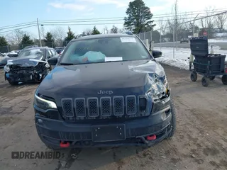 2022 Jeep Cherokee Trailhawk with VIN 1C4PJMBX7ND508267, listed as a IAAI auction lot 41356773 with 74,019 mi miles. Bid and sale history available at carsss.com. Image 12.