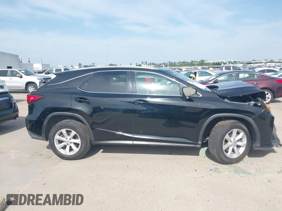 2016 Lexus RX 350 z VIN 2T2BZMCA4GC047800, wystawiony jako IAAI lot #42270406 z przebiegiem 112 181 mil mil oraz . Historia ofert i sprzedaży dostępna na DreamBid. Obrazek 13.