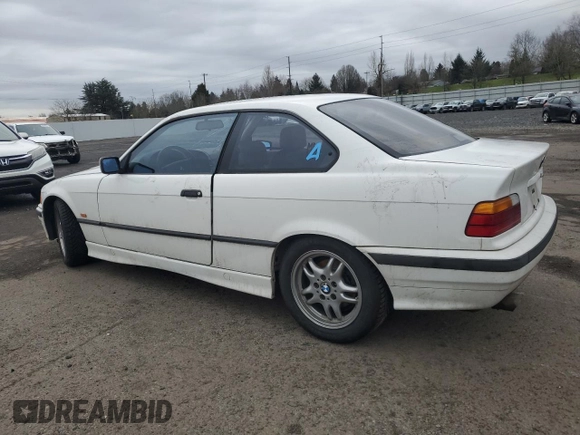 1997 BMW 3 Series 328is with VIN WBABG132XVET04869, listed as a Copart auction lot 45774015 with 123,280 mi miles and Salvage Title. Bid and sale history available at carsss.com. Image 2.