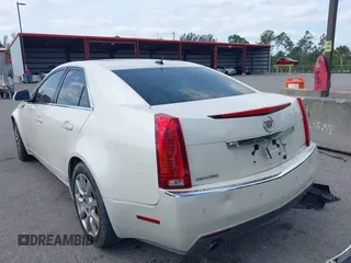 2008 Cadillac CTS RWD with VIN 1G6DV57V880128535, listed as a IAAI auction lot 39097540 with 153,140 mi miles and . Bid and sale history available at DreamBid. Image 3.