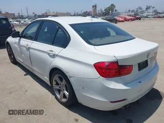 2014 BMW 3 Series 328i with VIN WBA3C1C59EK111396, listed as a IAAI auction lot 42471040 with 182,636 mi miles and . Bid and sale history available at DreamBid. Image 3.