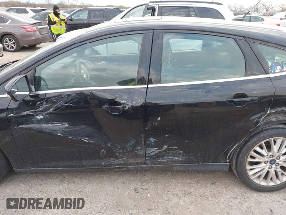 2018 Ford Focus Titanium с VIN 1FADP3N24JL252493, выставлен на аукционе IAAI как лот 41810980 с пробегом 119 998 миль миль и . История ставок и продаж доступна на DreamBid. Изображение 14.