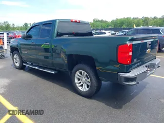 2014 Chevrolet Silverado 1500 LT with VIN 1GCRCREH2EZ323115, listed as a IAAI auction lot 42055949 with 61,337 mi miles and . Bid and sale history available at DreamBid. Image 3.