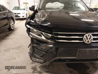 2021 Volkswagen Tiguan SE with VIN 3VV2B7AXXMM034880, listed as a IAAI auction lot 41979636 with 34,490 mi miles and . Bid and sale history available at DreamBid. Image 6.
