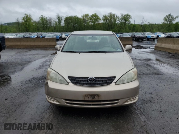 2002 Toyota Camry LE z VIN 4T1BE32K42U623283, wystawiony jako Copart lot #55631065 z przebiegiem 96 830 mil mil oraz Szkoda całkowita • Salvage title. Historia ofert i sprzedaży dostępna na DreamBid. Obrazek 5.