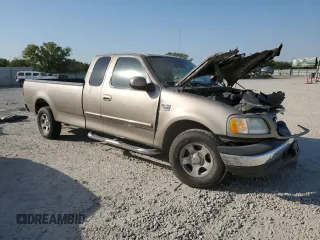 2002 Ford F-150 XL with VIN 1FTRX17L22NA48307, listed as a Copart auction lot 74238074 with 80,010 mi miles and Salvage title. Bid and sale history available at DreamBid. Image 4.