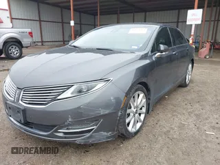 2015 Lincoln MKZ z VIN 3LN6L2G99FR604894, wystawiony jako IAAI lot #41433264 z przebiegiem 262 472 mil mil oraz . Historia ofert i sprzedaży dostępna na DreamBid. Obrazek 2.
