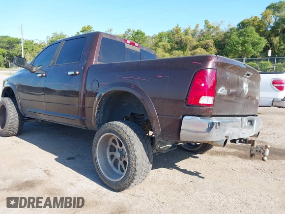 2015 Ram 1500 Big Horn with VIN 3C6RR7LT5FG597847, listed as a IAAI auction lot 42042971 with 212,541 mi miles and . Bid and sale history available at DreamBid. Image 3.