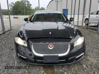 2014 Jaguar XJ Portfolio with VIN SAJWJ2GD5E8V69982, listed as a Copart auction lot 58933515 with 92,847 mi miles and Salvage title. Bid and sale history available at DreamBid. Image 5.