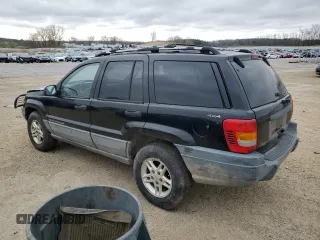 2000 Jeep Grand Cherokee Laredo with VIN 1J4GW48S2YC336733, listed as a Copart auction lot 54553315 with 284,402 mi miles and Non repairable. Bid and sale history available at DreamBid. Image 2.