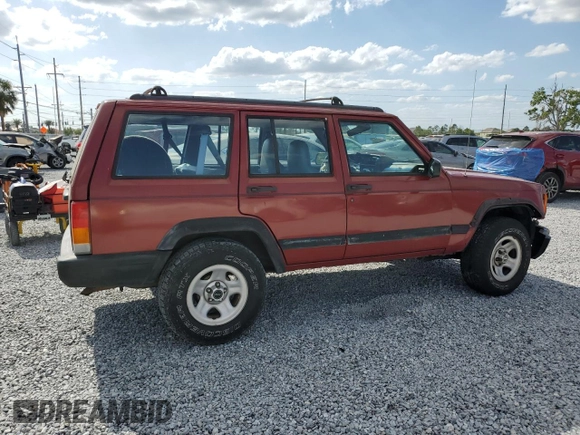 1998 Jeep Cherokee Sport with VIN 1J4FT68S4WL270134, listed as a Copart auction lot 51019695 with 246,945 mi miles and Non Repairable. Bid and sale history available at carsss.com. Image 3.