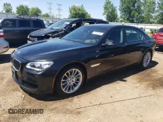 2014 BMW 7 Series ALPINA B7 xDrive with VIN WBAYF8C51ED653036, listed as a Copart auction lot 58156764 with 116,611 mi miles and Salvage Title. Bid and sale history available at DreamBid. Image 1.