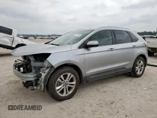 2020 Ford Edge SEL z VIN 2FMPK3J93LBA57279, wystawiony jako Copart lot #57261985 z przebiegiem 112 411 mil mil oraz Szkoda całkowita • Salvage title. Historia ofert i sprzedaży dostępna na DreamBid. Obrazek 1.