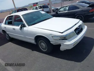 1996 Mercury Grand Marquis GS with VIN 2MELM74WXTX650841, listed as a IAAI auction lot 41936608 with 205,964 mi miles and . Bid and sale history available at DreamBid. Image 1.