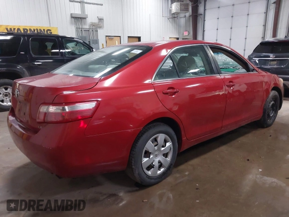 2009 Toyota Camry with VIN 4T4BE46K79R110464, listed as a IAAI auction lot 42108337 with 212,128 mi miles. Bid and sale history available at carsss.com. Image 4.