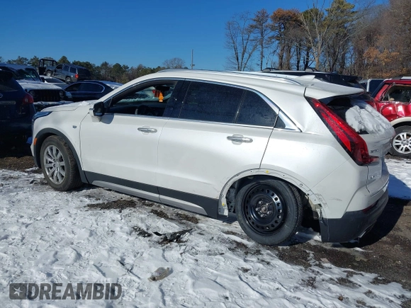 2022 Cadillac XT4 AWD Premium Luxury with VIN 1GYFZDR4XNF139337, listed as a IAAI auction lot 41326816 with 26,823 mi miles and . Bid and sale history available at carsss.com. Image 14.