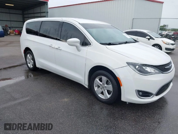 2020 Chrysler Pacifica Touring with VIN 2C4RC1FG4LR135808, listed as a IAAI auction lot 41932205 with 152,073 mi miles and . Bid and sale history available at DreamBid. Image 1.