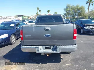 2004 Ford F-150 STX with VIN 1FTRX12W04NB32291, listed as a IAAI auction lot 42088596 with 233,491 mi miles. Bid and sale history available at carsss.com. Image 13.