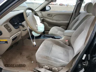 2001 Kia Optima LX z VIN KNAGD126315028712, wystawiony jako Copart lot #85302564 z przebiegiem 81 722 mil mil oraz Nie do naprawy • Non repairable. Historia ofert i sprzedaży dostępna na DreamBid. Obrazek 7.